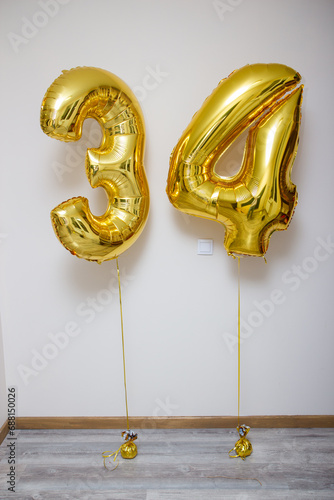 gold and silver helium balloons and gold foil numbers34