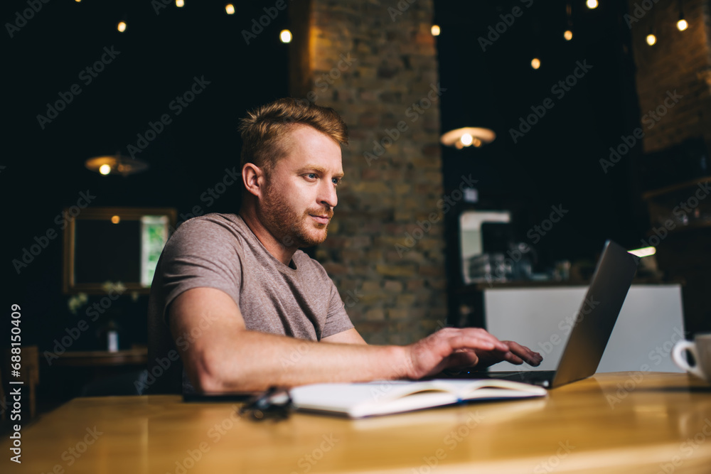 Focused man studying on laptop Focused man studying on laptop