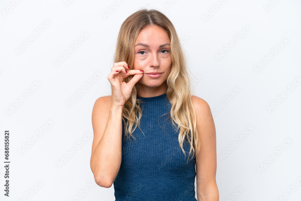 Young Russian woman isolated on white background showing a sign of silence gesture