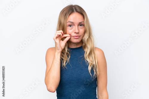 Young Russian woman isolated on white background showing a sign of silence gesture
