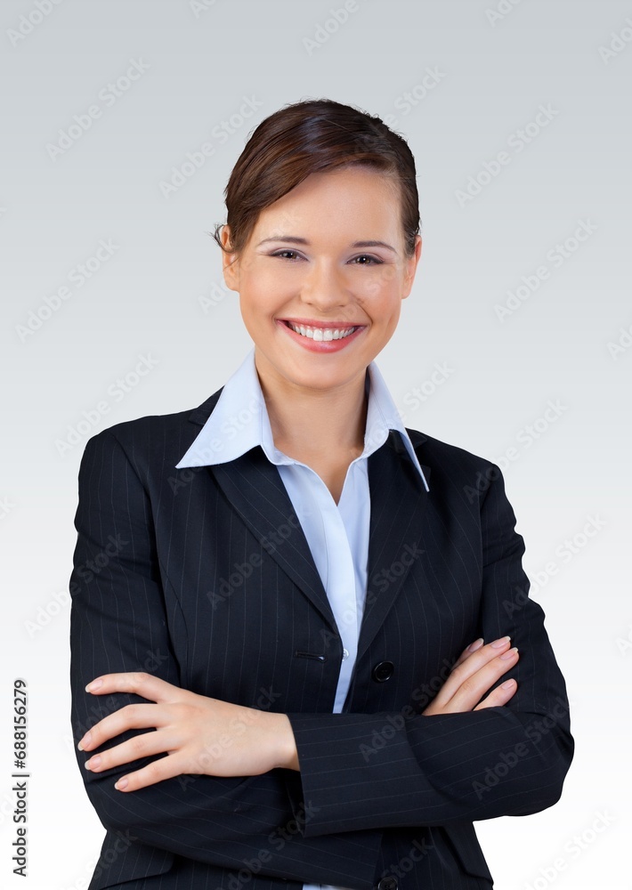 Young happy business woman posing