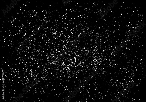 Distressed white grain texture on dark background.