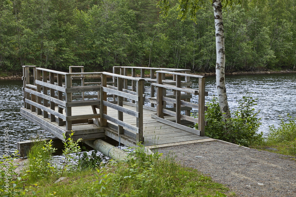 Wooden platform at the river Skellefteälven in Skelleftea, Sweden, Europe
