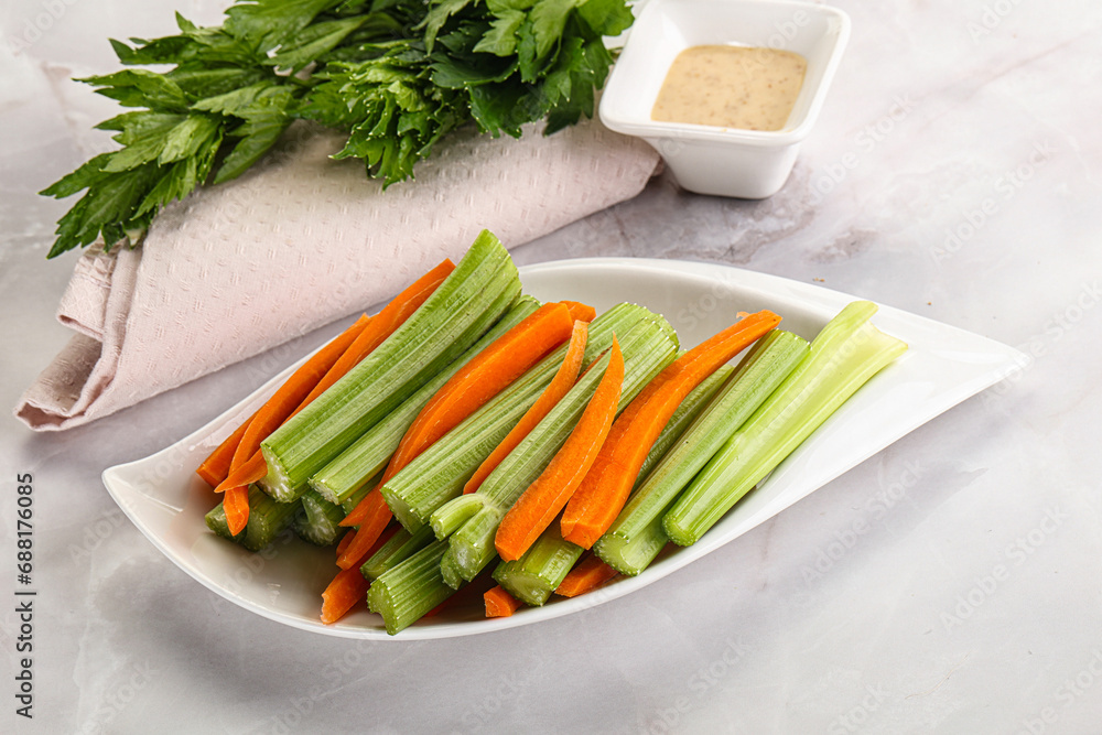 Vegan cuisine - dietary celery and carrot cticks Vegan cuisine - dietary celery and carrot cticks