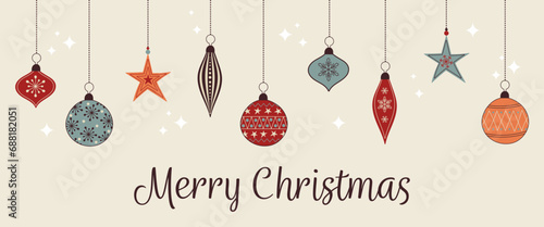 Merry Christmas - Schriftzug in englischer Sprache - Frohe Weihnachten. Weihnachtskarte mit bunten Christbaumkugeln. photo