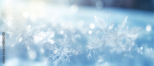 pure white snowflakes on light blue background, wide banner