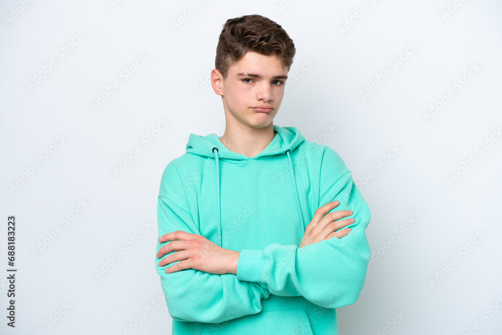 Teenager Russian man isolated on white background making doubts gesture while lifting the shoulders Teenager Russian man isolated on white background making doubts gesture while lifting the shoulders