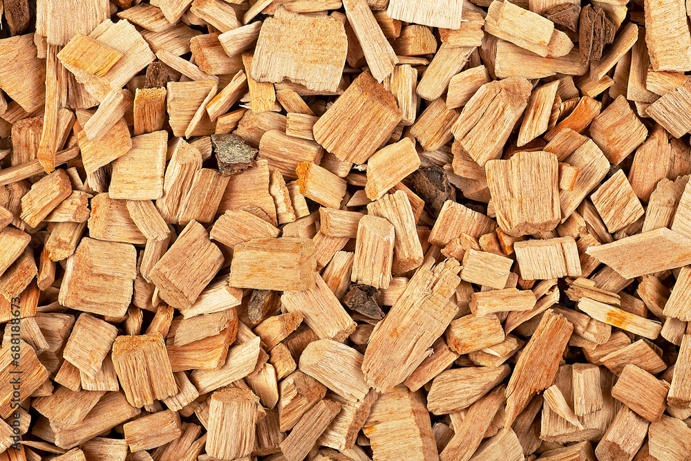 Wood chips background, top view. Natural material. Wood chips for smoking. Wood chips background, top view. Natural material. Wood chips for smoking.
