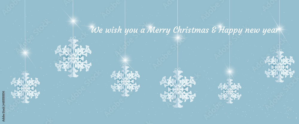 Beautiful paper snowflakes hang on a white thread with a bow, for decoration of backgrounds, cards, web pages. Beautiful paper snowflakes hang on a white thread with a bow, for decoration of backgrounds, cards, web pages.