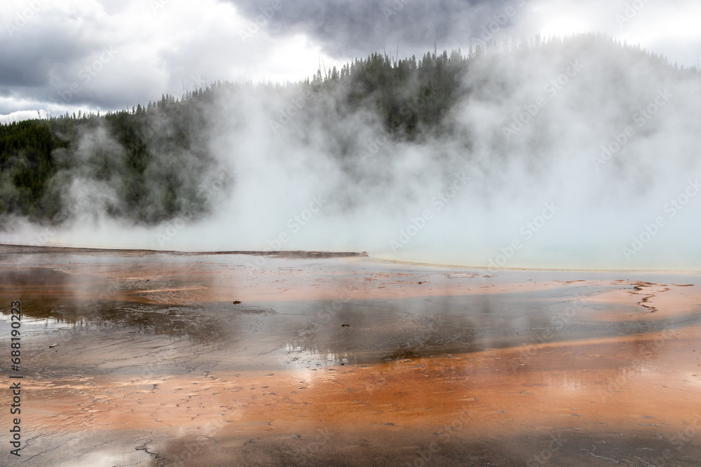 The Grand Prismatic Spring on a cold cloudy winter day in Yellowstone National Park is the largest hot spring in the United States, it is located in the Midway Geyser Basin. Yellowstone, Wyoming
