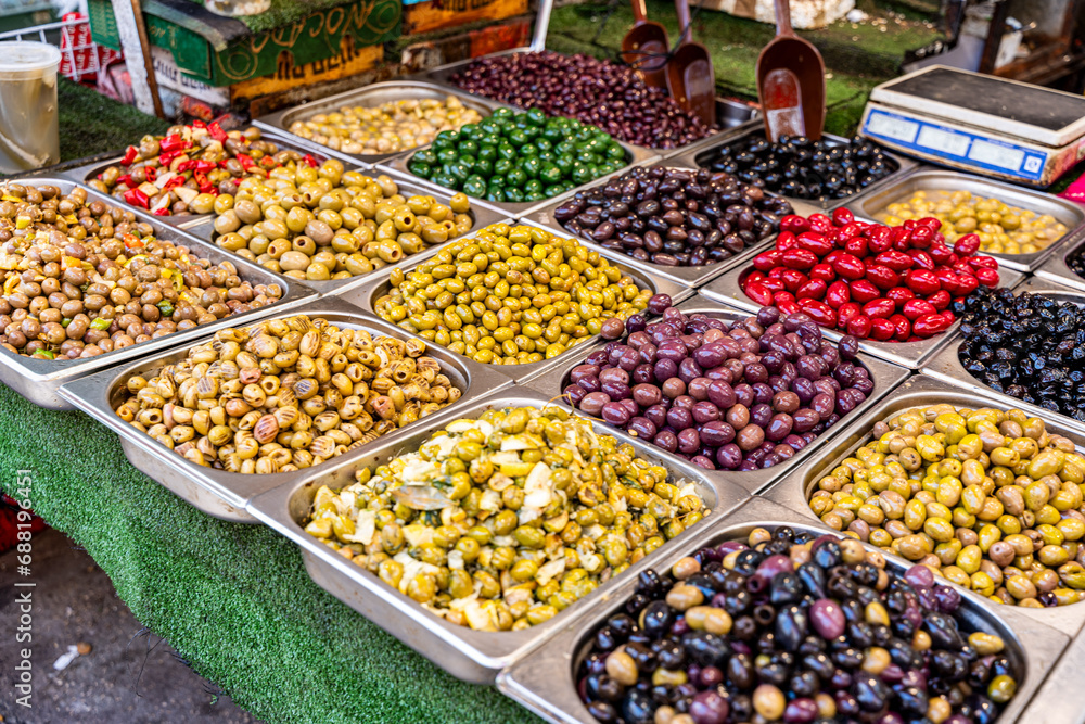 Variously prepared olives are sold at the Carmel market in Tel Aviv-Jaffa