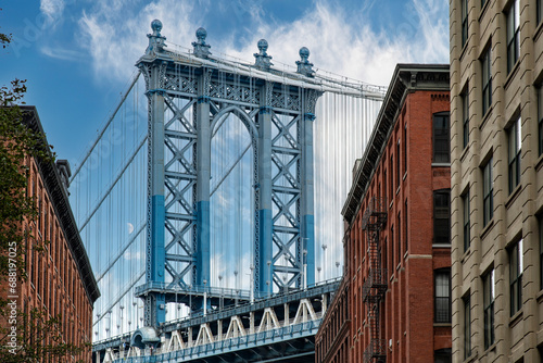 Iconic view of Manhattan Bridge, New York City, USA seen from Washington Street in Dumbo (Down Under the Manhattan Bridge Overpass), Brooklyn area