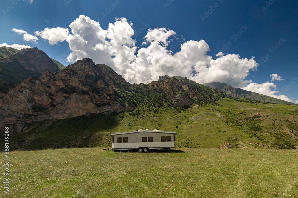 Motorhome trailer in the mountains. Chegem gorge. The nature of the North Caucasus.