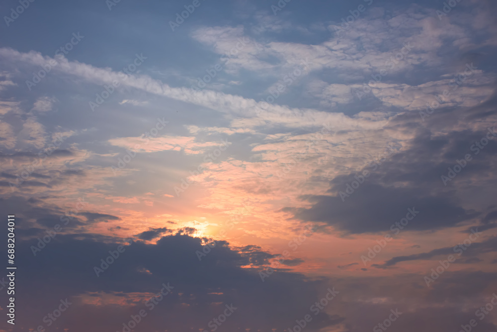 Beautiful sky background - Sunset Sunrise sky with light clouds and real sun. Beautiful sky background - Sunset Sunrise sky with light clouds and real sun.