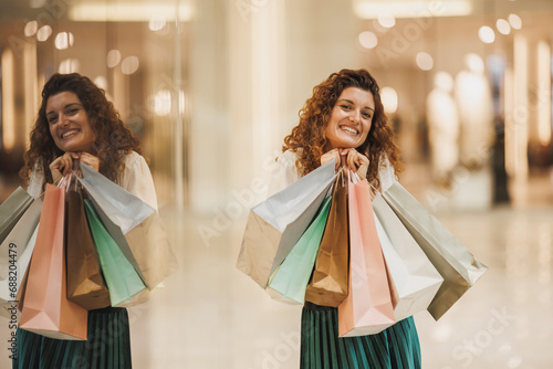 A Joyful Shopaholic Embracing Retail Therapy With A Bright Smile