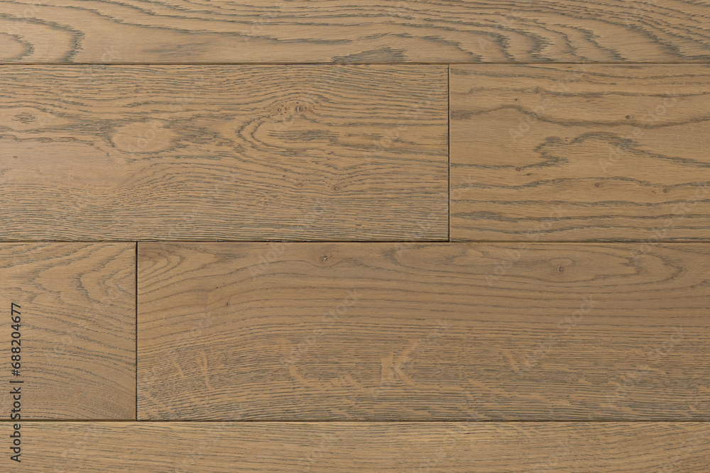 Fototapeta premium Texture of natural oak parquet close-up. Wooden boards for polished laminate. Hardwood sample background