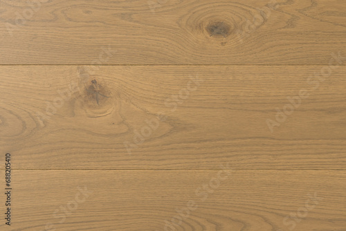 Texture of natural oak parquet close-up. Wooden boards for polished laminate. Hardwood sample background