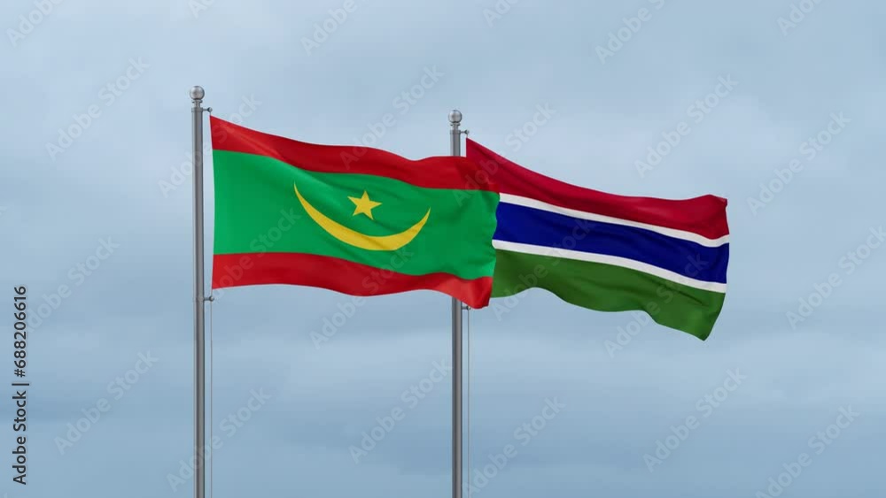 Gambia flag and Mauritania flag waving together on cloudy sky, endless seamless loop, two country relations concept Gambia flag and Mauritania flag waving together on cloudy sky, endless seamless loop, two country relations concept