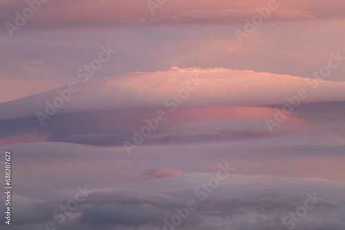 Beautiful lenticular clouds in the sky at sunset