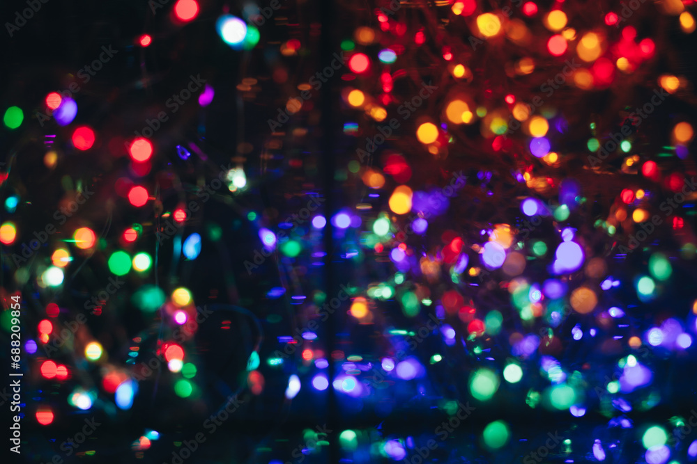 Fototapeta premium texture of christmas colored lights glowing