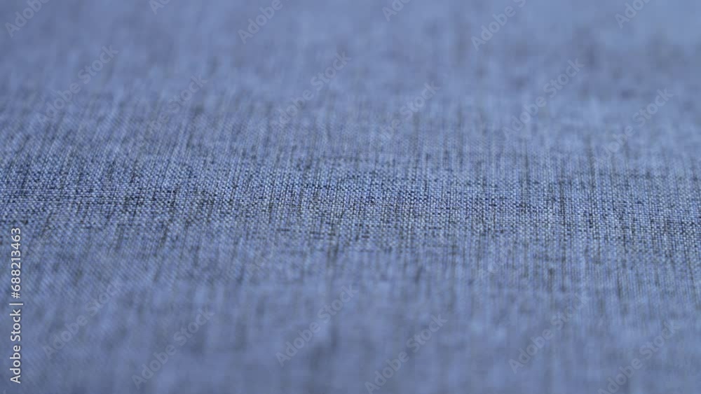 Blue denim background. Jeans cloth material. Macro. Rotation Blue denim background. Jeans cloth material. Macro. Rotation