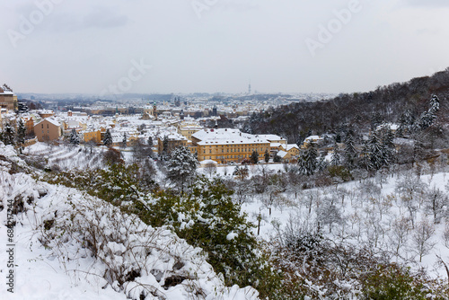 Romantic snowy Prague Lesser Town historical Roofs, Czech Republic