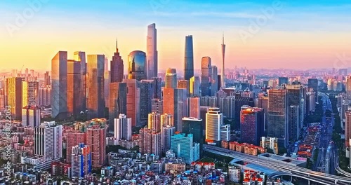 Aerial shot of city buildings skyline at sunset in Guangzhou, Guangdong Province, China photo