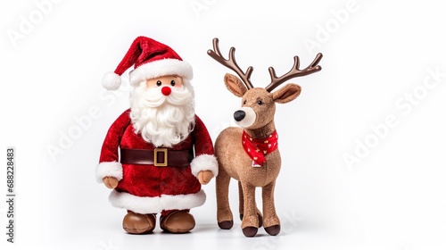 Santa Claus together with his reindeer plush toy isolated on white background,  Xmas deer and Santa soft baby toys. © BackgroundHolic