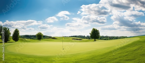 Clouds and Blue Sky over a green Golf Course on a sunny day