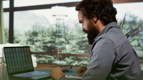 Fotografie Accounting expert ensuring perfect business schedule to obtain profit from global investments, rich man living in elegant posh forest villa