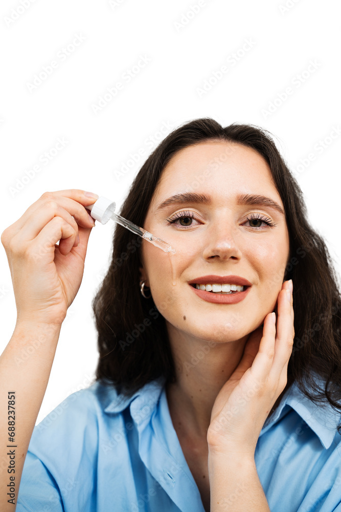 Girl is applying hyaluronic serum with pipette on face. Young woman with acid dropper is applying drops of acid on her skin. Girl is applying hyaluronic serum with pipette on face. Young woman with acid dropper is applying drops of acid on her skin.