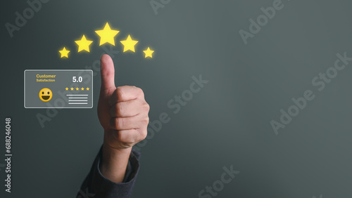 Customer satisfaction feedback review concept. Hand with thumb up Positive emotion happy smile face and five star with copy space. Customer service experience and business satisfaction survey.
