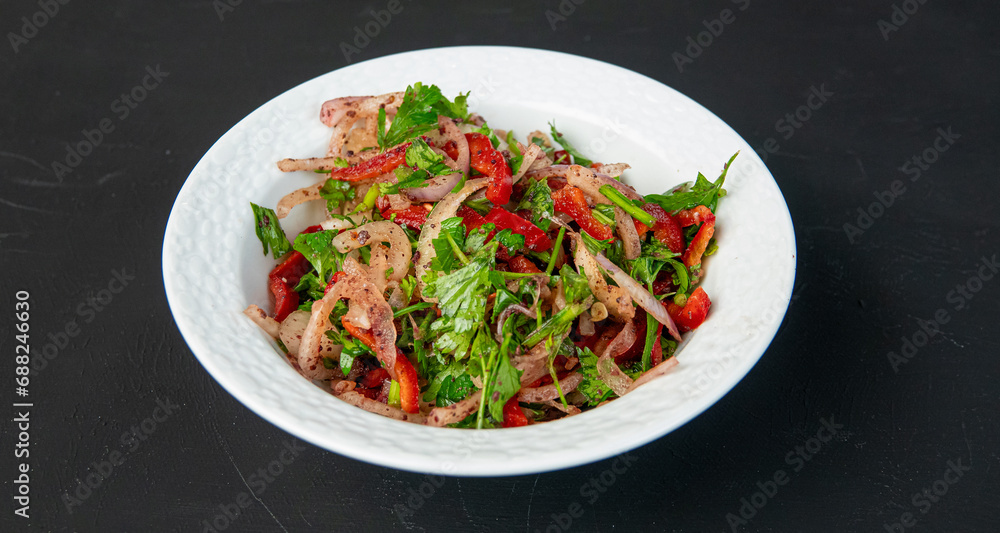 Salad with onion, parsley, red pepper
sumach and tomatoes in porcelain bowl on dark background. Appetizer for Turkish pizza, pita pizza Lahmacun Salad with onion, parsley, red pepper
sumach and tomatoes in porcelain bowl on dark background. Appetizer for Turkish pizza, pita pizza Lahmacun