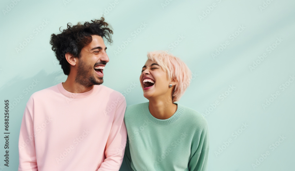 Young positive couple enjoy togetherness and laugh. Happy faces. Young positive couple enjoy togetherness and laugh. Happy faces.