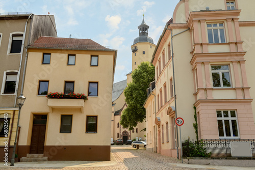 Fototapeta Naklejka Na Ścianę i Meble -  View of city street with buildings and church