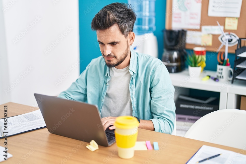 Young hispanic man business worker using laptop working at office Young hispanic man business worker using laptop working at office