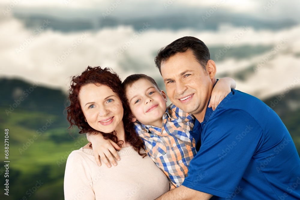 Happy young family have fun in the garden Happy young family have fun in the garden