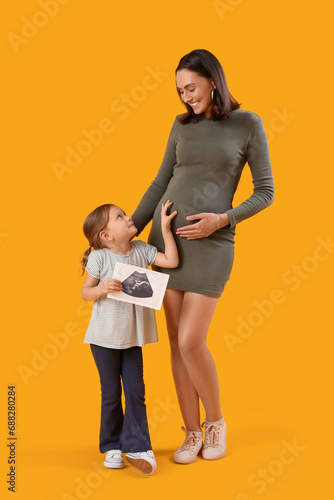 Beautiful pregnant mother a...