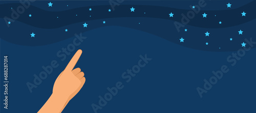 Male hand pointing to starry sky with space for text
