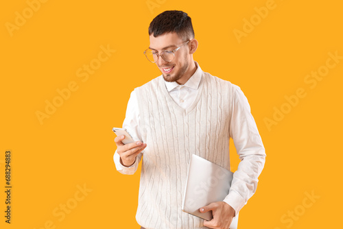 Young man in eyeglasses wit...