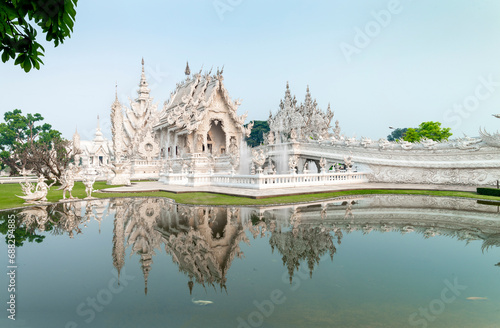 Wat Rong Khun,the White Temple at dawn,and surrounding pond,outskirts of Chiang Rai,Northern Thailand. © Neil
