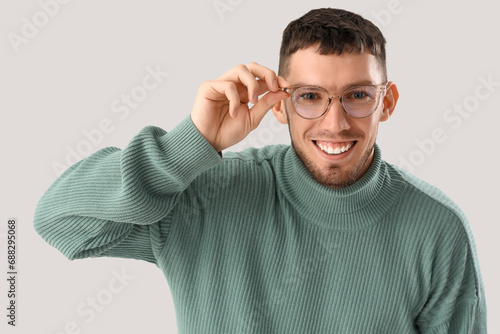 Young man in eyeglasses on ...