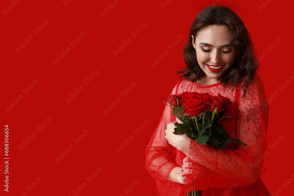 Beautiful young woman with bouquet of roses on red background Beautiful young woman with bouquet of roses on red background