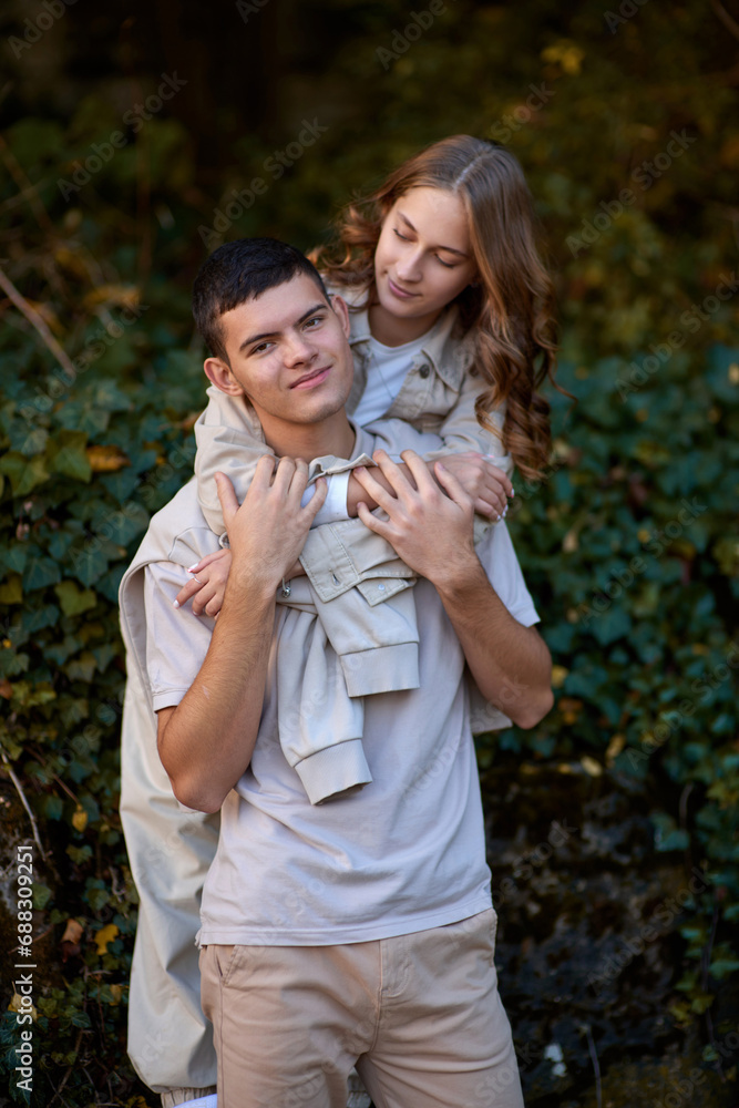 Young Cute Female Hugs Boyfriend. In Autumn Outdoor. Lovers Walking in Park. Attractive Funny Couple. Lovestory in Forest. Man and Woman. Cute Lovers in the Park. Family Concept. Happy Couple. Young Cute Female Hugs Boyfriend. In Autumn Outdoor. Lovers Walking in Park. Attractive Funny Couple. Lovestory in Forest. Man and Woman. Cute Lovers in the Park. Family Concept. Happy Couple.