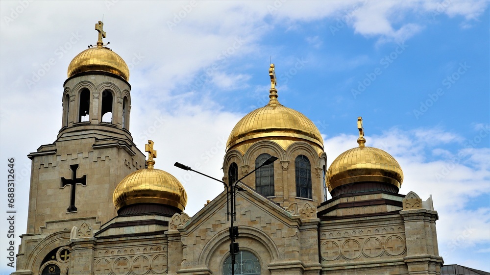 Beautiful majestic Orthodox church with towers and golden domes with crosses, Dormition of the Mother of God Cathedral, Varna, Bulgaria
