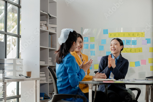 Explaining the report at the meeting, Collaborate to solve problems in the meeting room, Discuss startup business with the team at the office, Work together as a team,