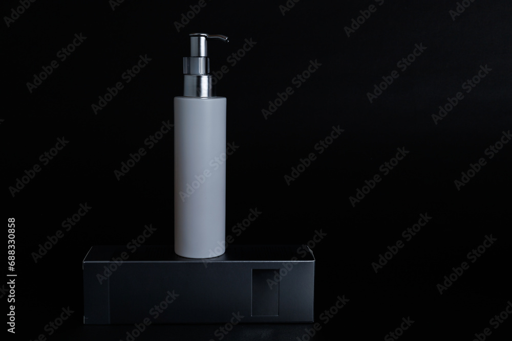 Blank skin care porduct and its box isolated on black Blank skin care porduct and its box isolated on black