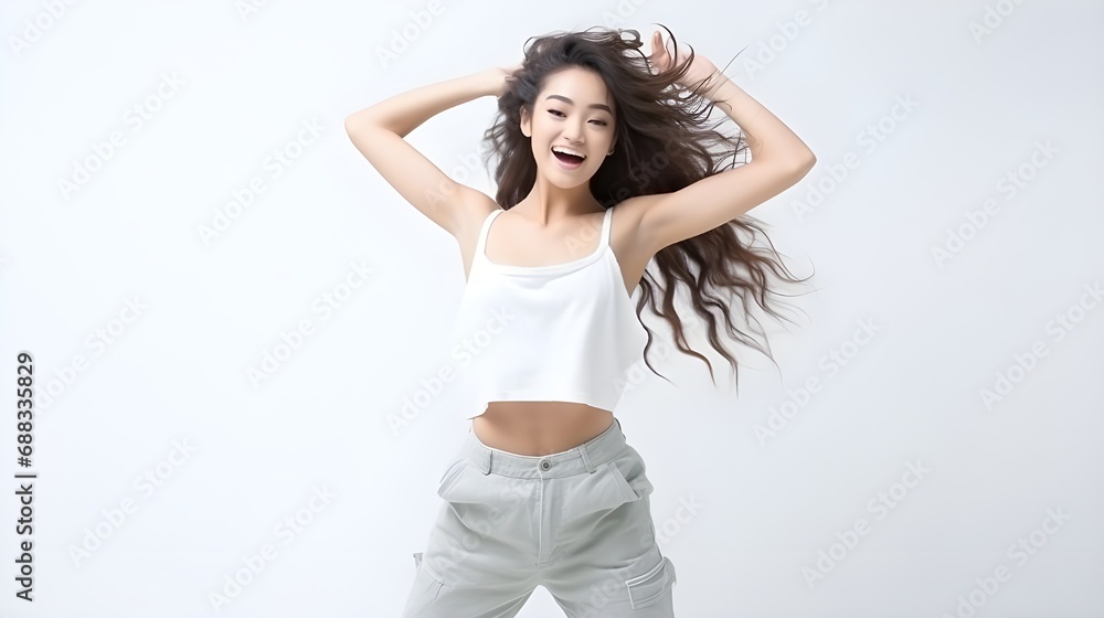 People emotions, lifestyle leisure and beauty concept. upbeat happy and cheerful asian girl dancing and having fun, isolated on white wall People emotions, lifestyle leisure and beauty concept. upbeat happy and cheerful asian girl dancing and having fun, isolated on white wall