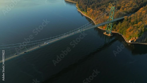 Aerial view of Lions Gate Bridge and Stanley Park at dawn. Canada photo