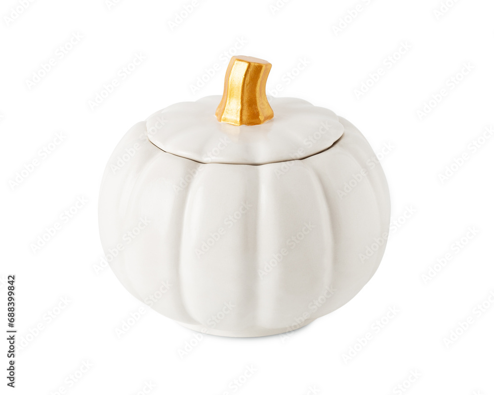 White ceramic pumpkin on a white background. Pumpkin-shaped candle. White ceramic pumpkin on a white background. Pumpkin-shaped candle.